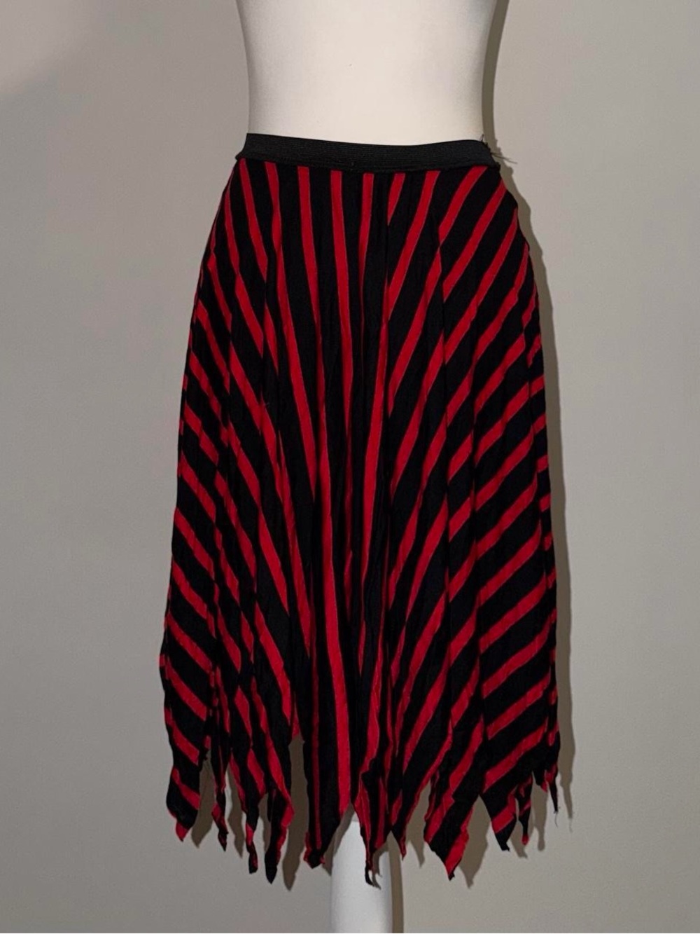 halloween costume black and red striped skirt with fringe at the bottom